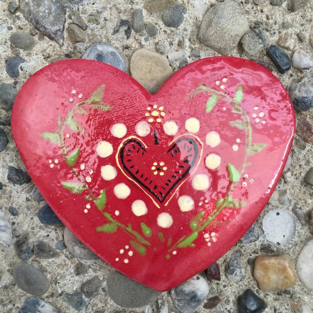 A heart shaped ceramic piece made by Camila