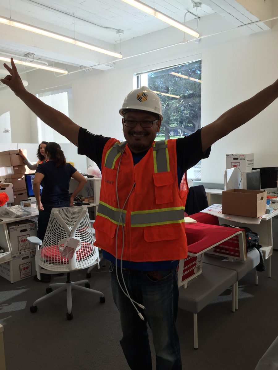 Orlando wearing a hard hat at BAMPFA