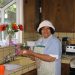 A woman making hand-made corn tortillas